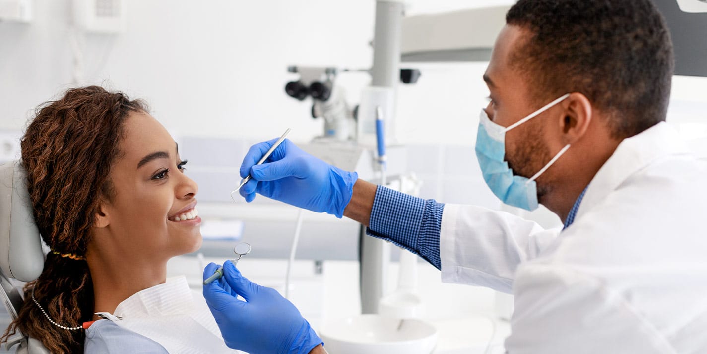 doctor getting to know dental patient