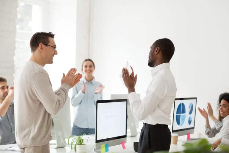 Employee being given award