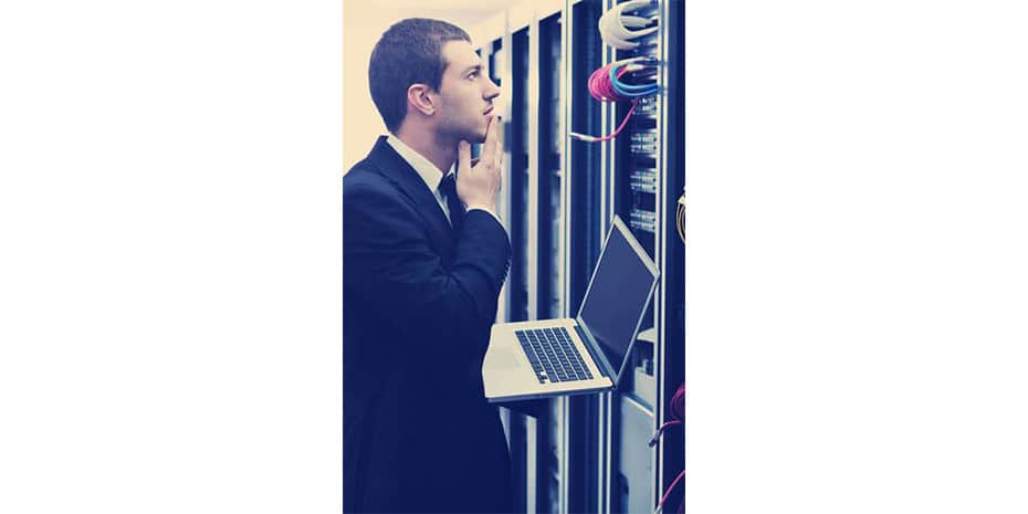 rsz_1businessman-with-laptop-in-network-server-room