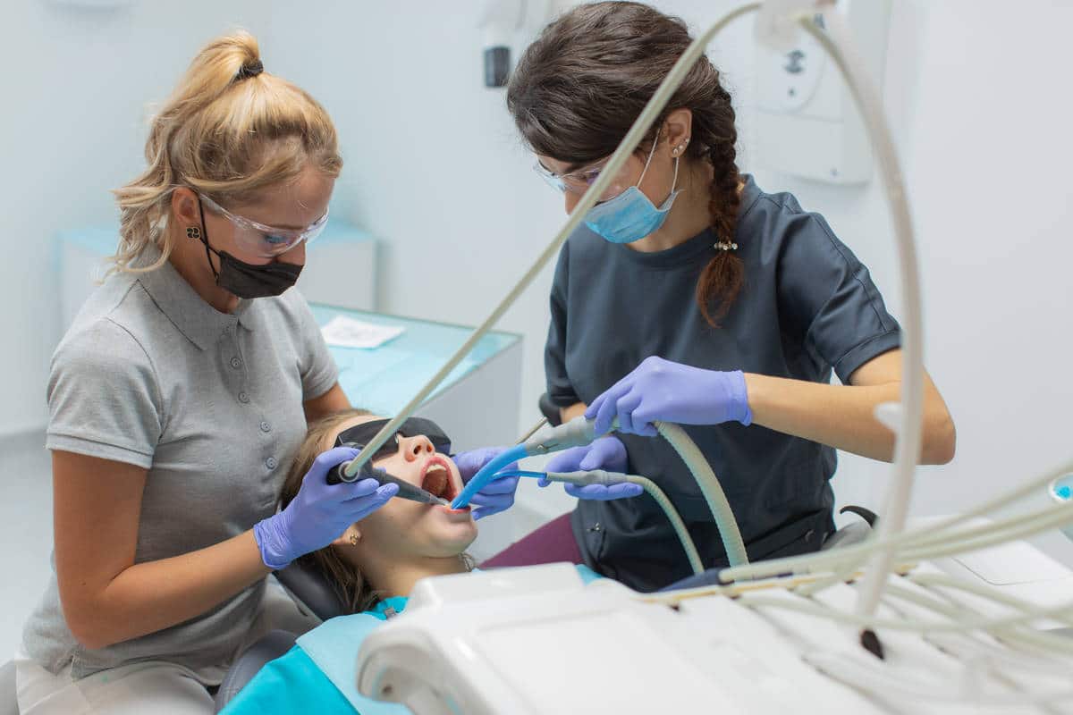 dentist_working_through_patient_saliva