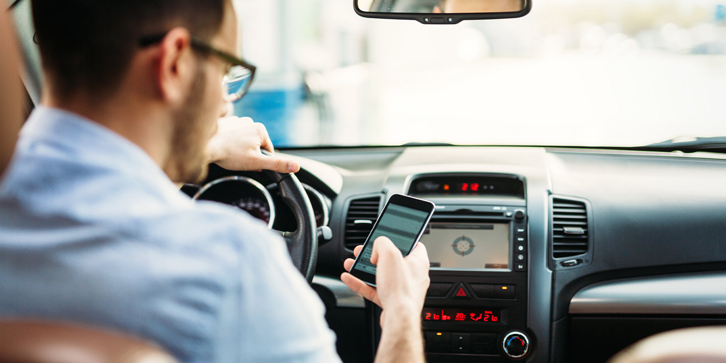 man waiting in car for appointment